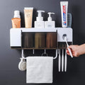 Multifunctional Bathroom Toothbrush Holder – Wall-Mounted Rack with Automatic Toothpaste Dispenser, 3 Cups, Towel Rod, and Dustproof Storage