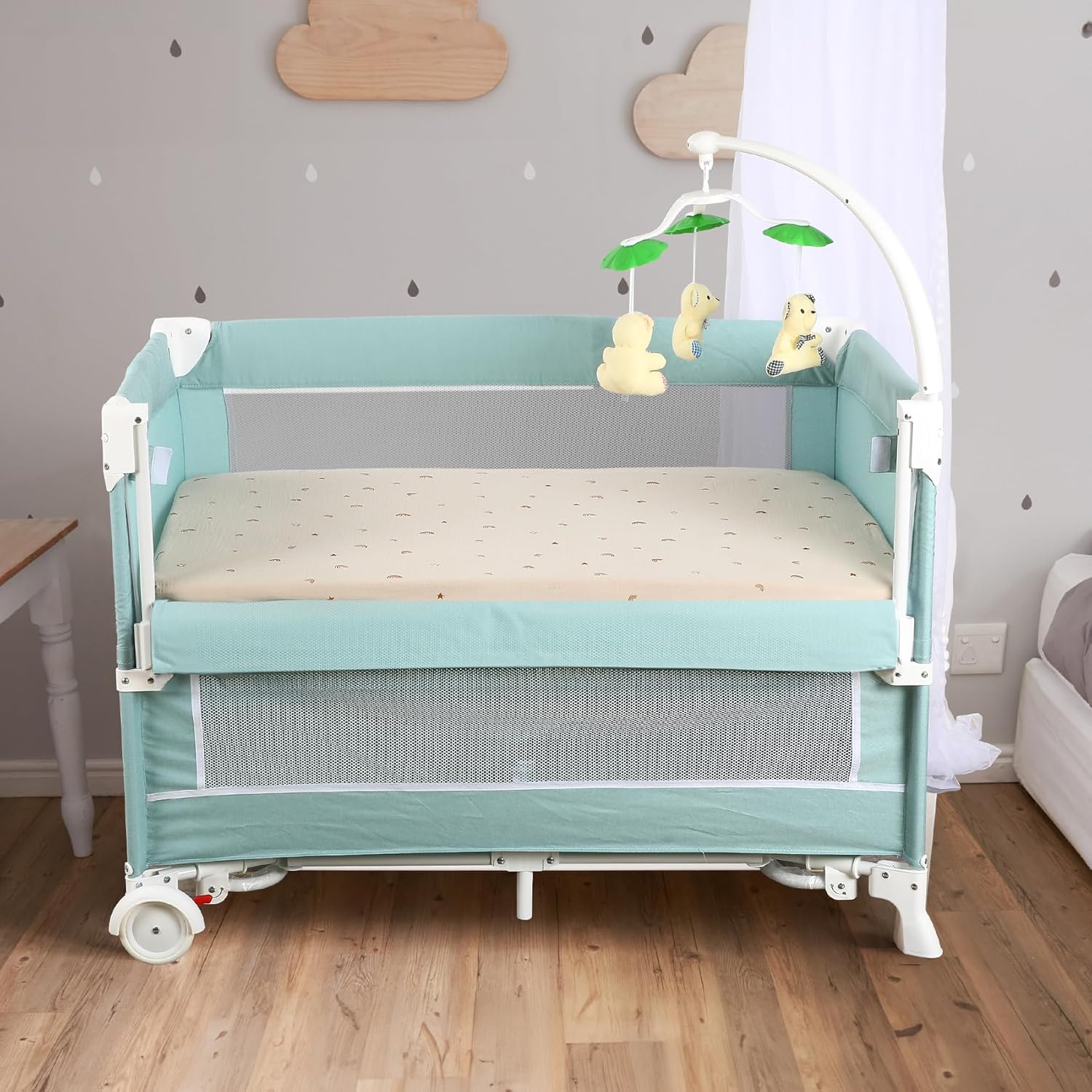 Folding Mini Metal Crib with Guard Rails | Under-Bed Storage & Locking Wheels